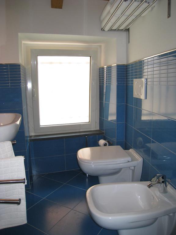 Casa Vacanze Albachiara Massa  Værelse billede